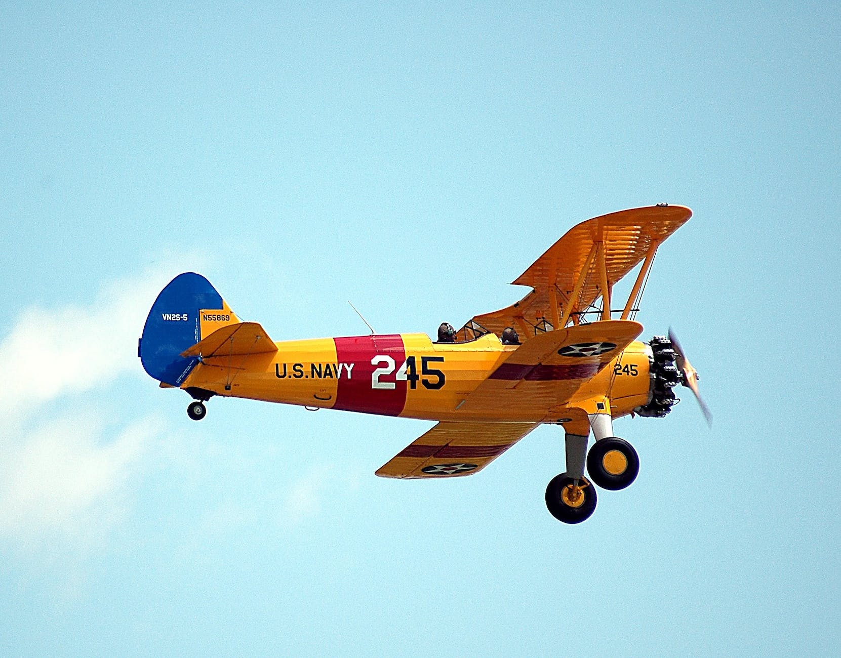 airplane flying against sky